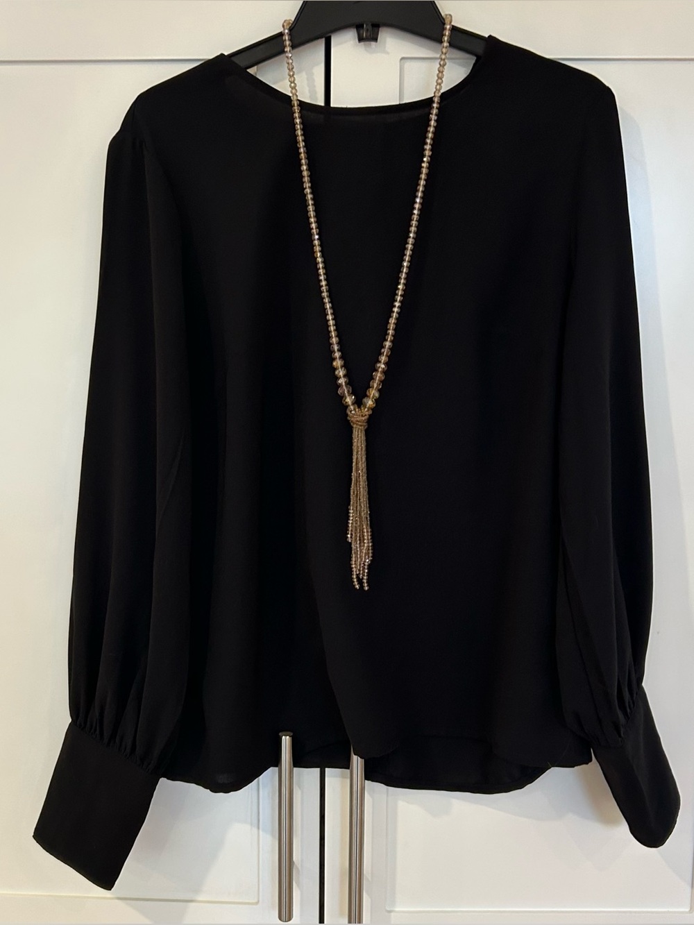 Beaded lariat necklace with multi-strand fringe tassel wrapped knot